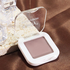 evpct compact next to coin showing small travel-friendly size