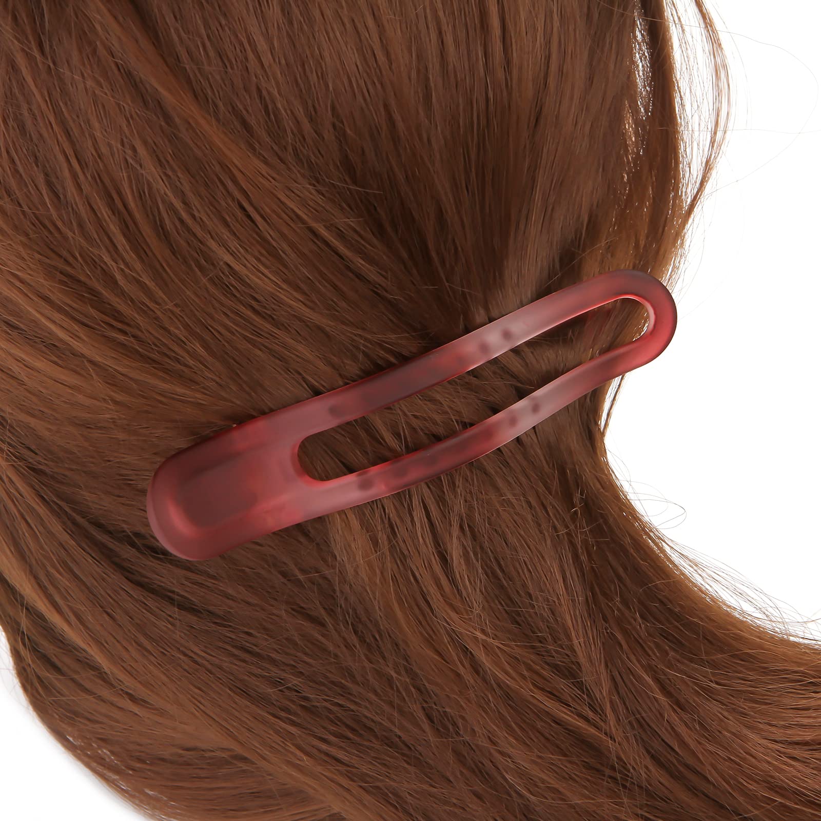 EWSNM clip holding thick hair section demonstrating strong clamp benefit