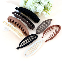 Exacoo neutral-colored clips displayed on a mantel as a tasteful accessory gift