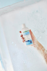 Exederm applied to hand demonstrating easy spread and scalp-soothing benefit