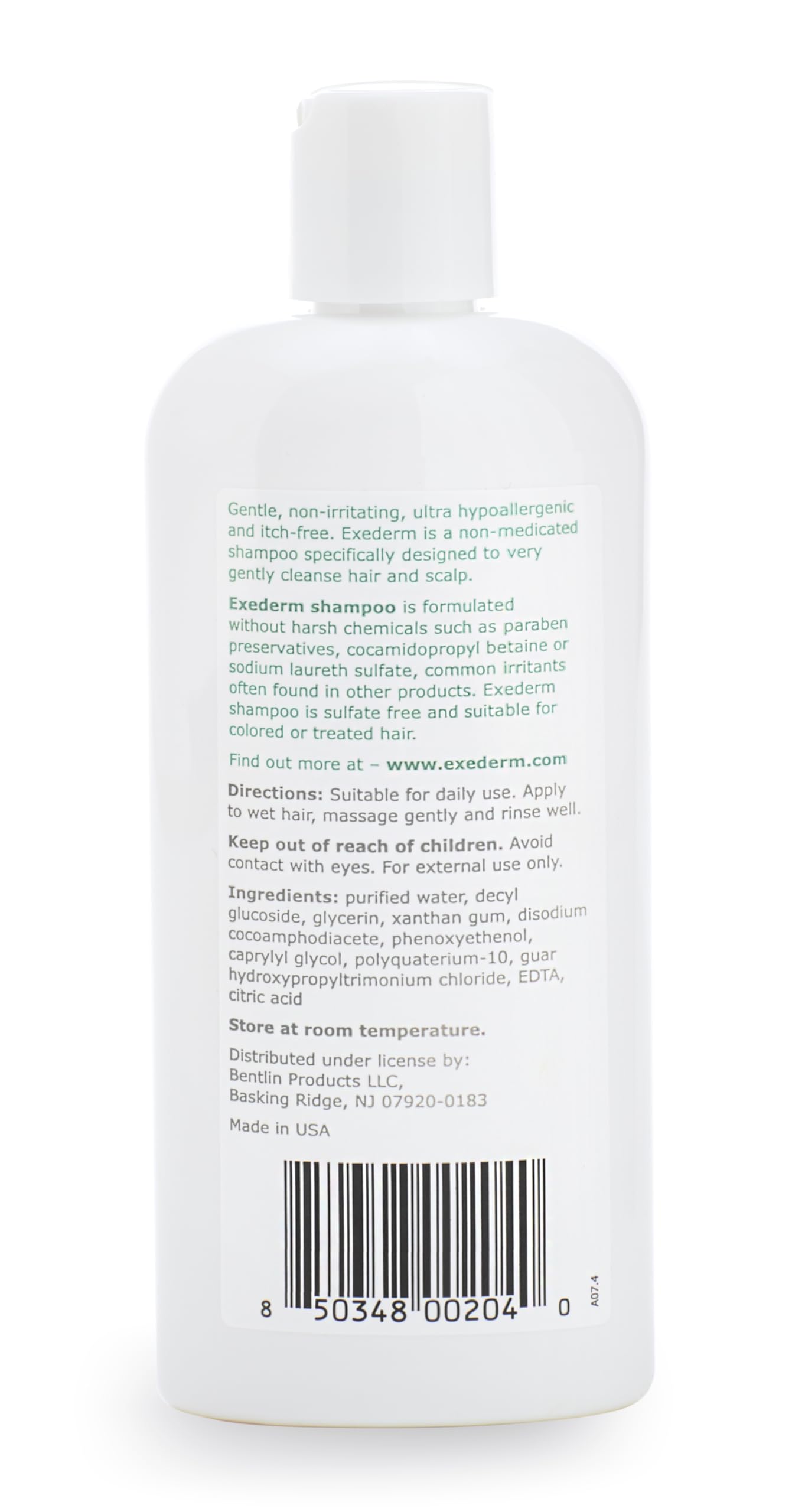 Exederm bottle next to hand showing 8 fl oz size