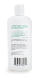 Exederm bottle next to hand showing 8 fl oz size