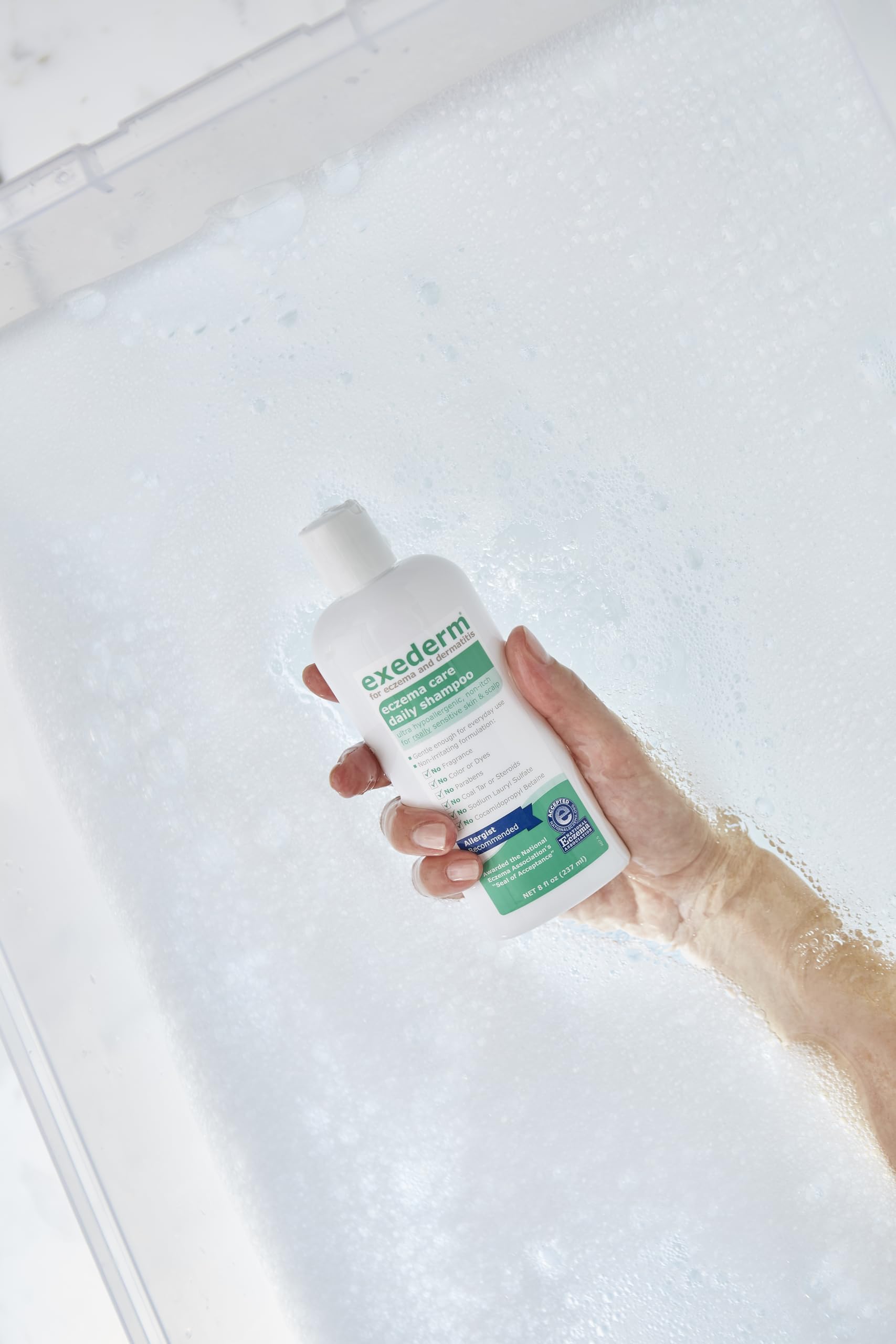 Exederm low-foam texture on hand illustrating mild cleansing