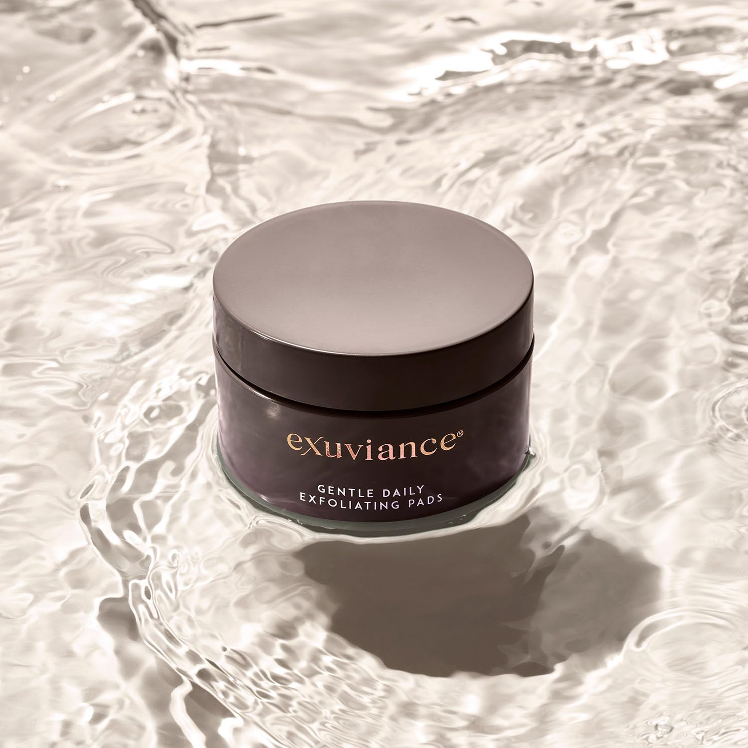 EXUVIANCE label detail showing dermatologist tested and paraben-free benefit