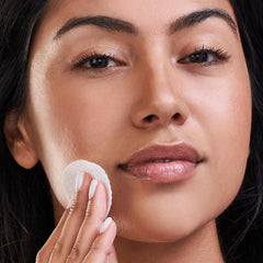 EXUVIANCE label close-up with ingredient callouts for transparency benefit
