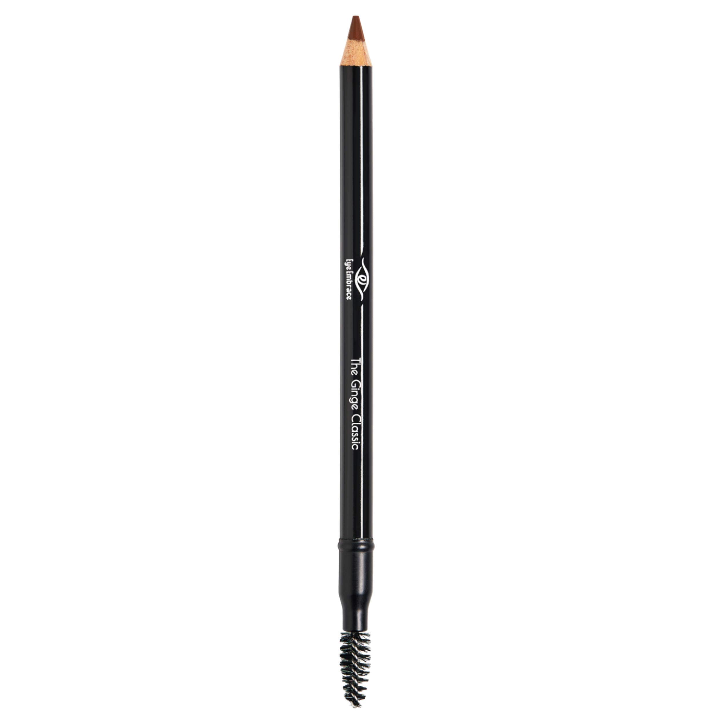 Eye Embrace pencil beside coin showing compact travel-friendly size