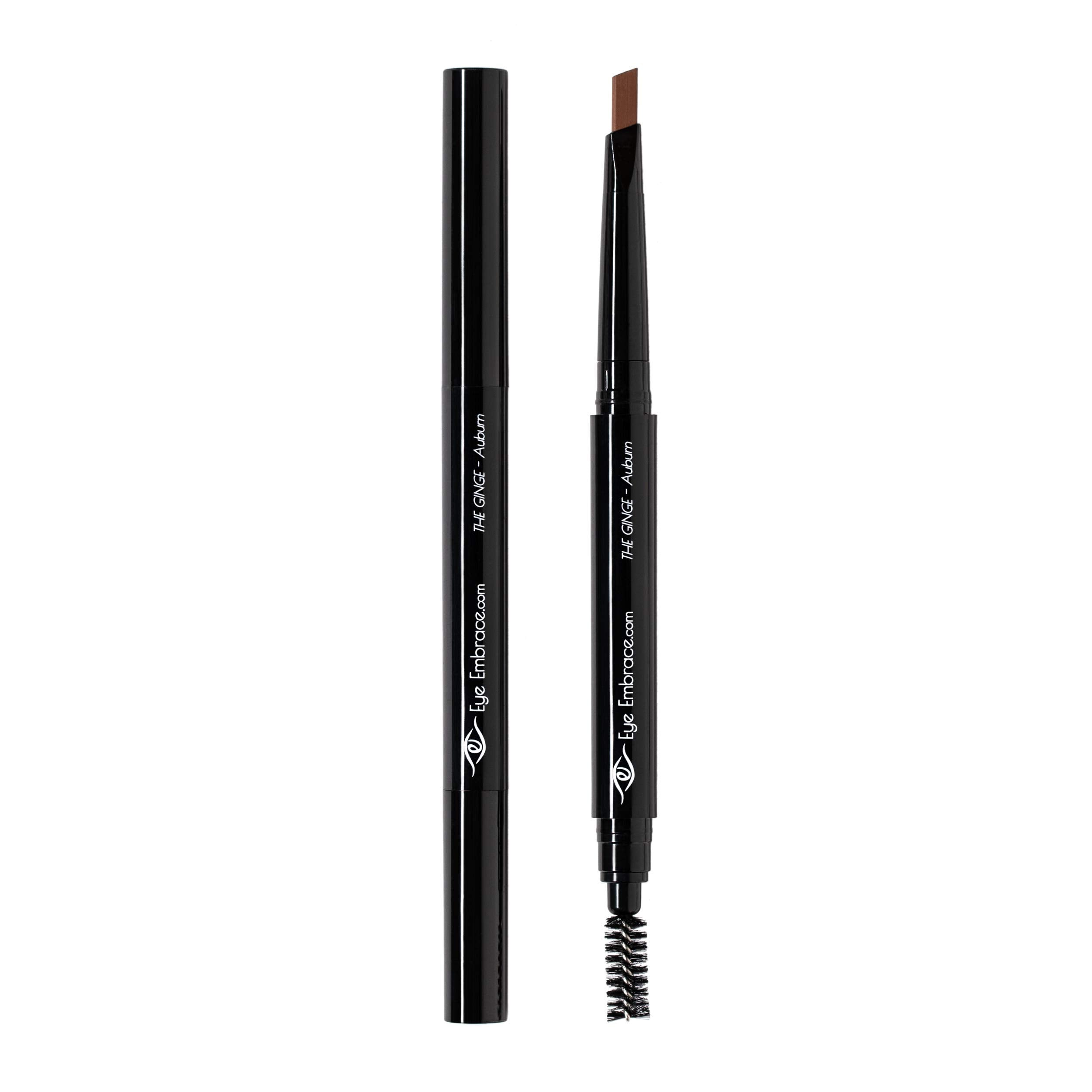 Eye Embrace pencil held in hand for scale, shows compact travel-friendly size