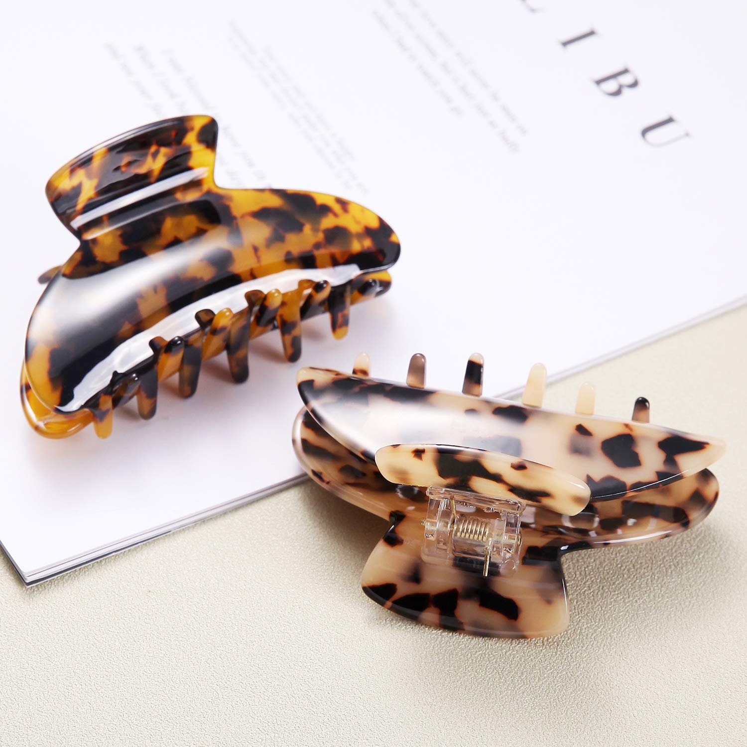 Eyegla clips securing thick hair with no slip for confident all-day wear