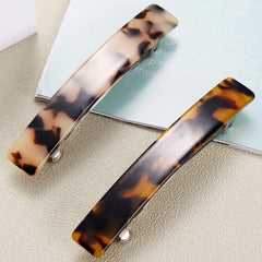 Eyegla metal French clasp detail demonstrating secure spring mechanism and firm hold
