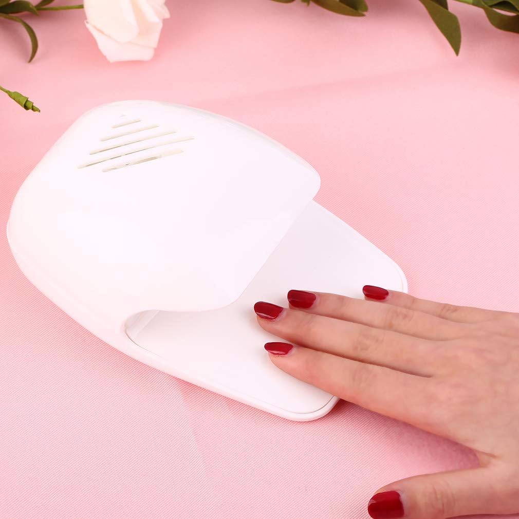 eyxformula packaging and contents laid out emphasizing included portable nail dryer