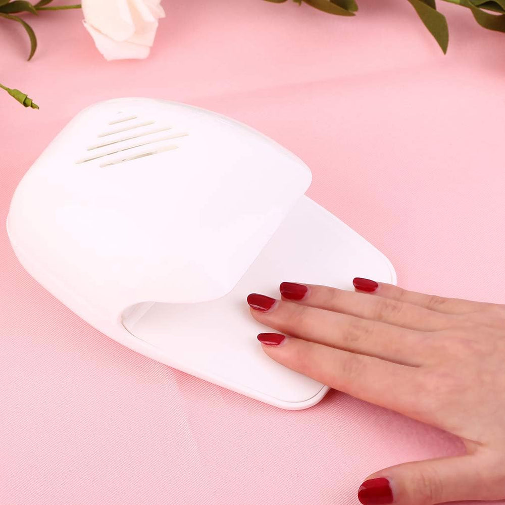 eyxformula packaging and contents laid out emphasizing included portable nail dryer