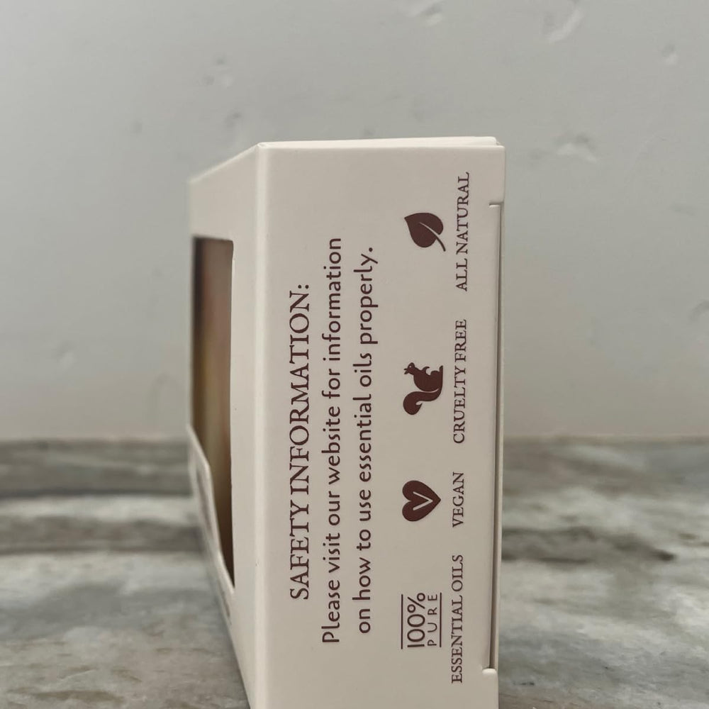 Hand holding Fabulous Frannie 4 oz bar to show scale and convenient travel size benefit