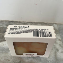 Fabulous Frannie patchouli soap on bathroom shelf suggesting natural scent and decor benefit