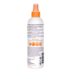 Fairy Tales spray action in hand demonstrating quick pre-swim application