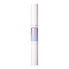 FALSCARA KISS tube next to a coin showing compact travel-friendly size