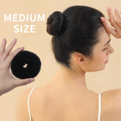 Fandamei bun on a child demonstrating neat ballet hairstyle for performances