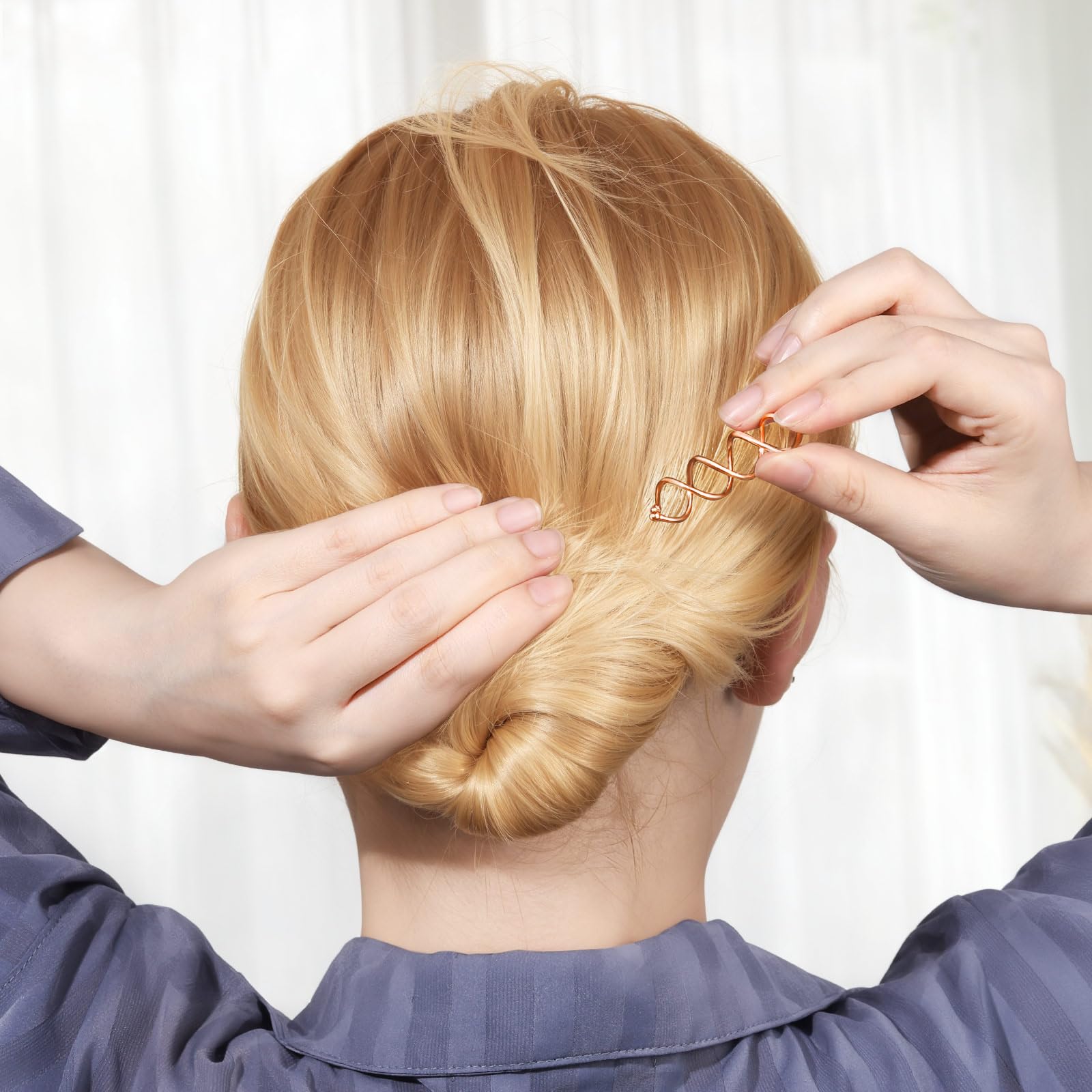 Fandamei pin in use securing a bun, offering comfortable all-day hold