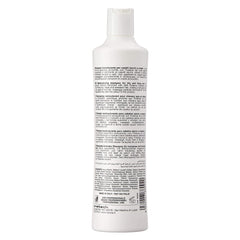 Fanola milk protein lather closeup on hair demonstrating hydration and smoother texture