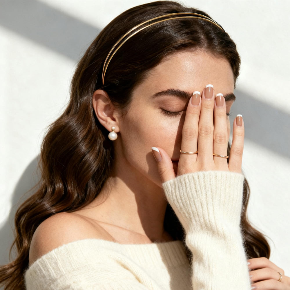 FANSSYA double-band headband front view showing minimalist gold shine and refined design