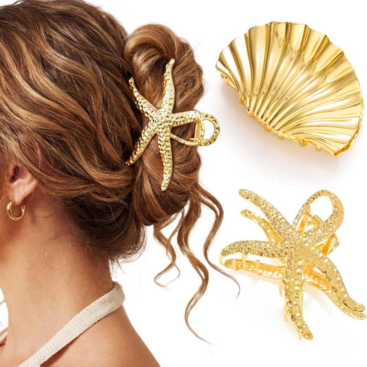 Fashey gold starfish clip front view shows elegant seashell shape and polished finish