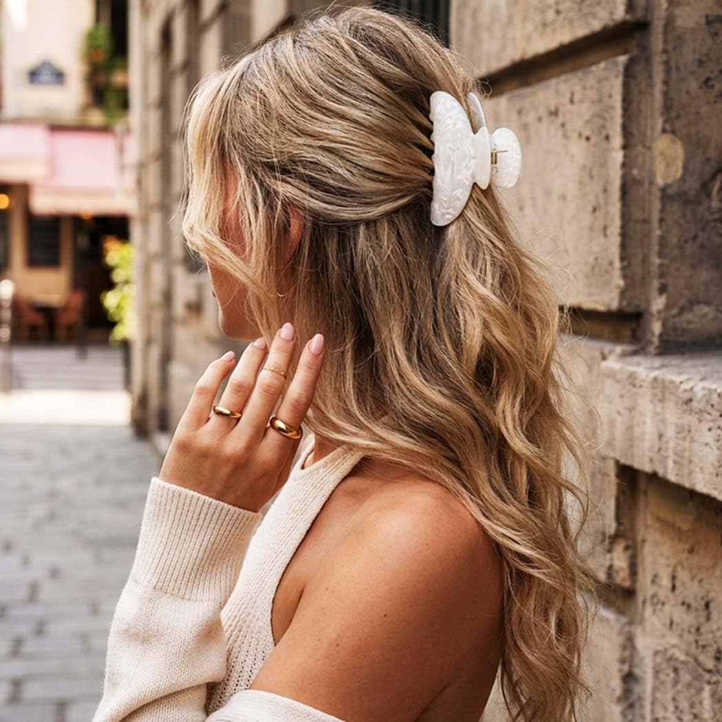 Fashey lifestyle shot of woman wearing the pink clip adding a chic outfit accent