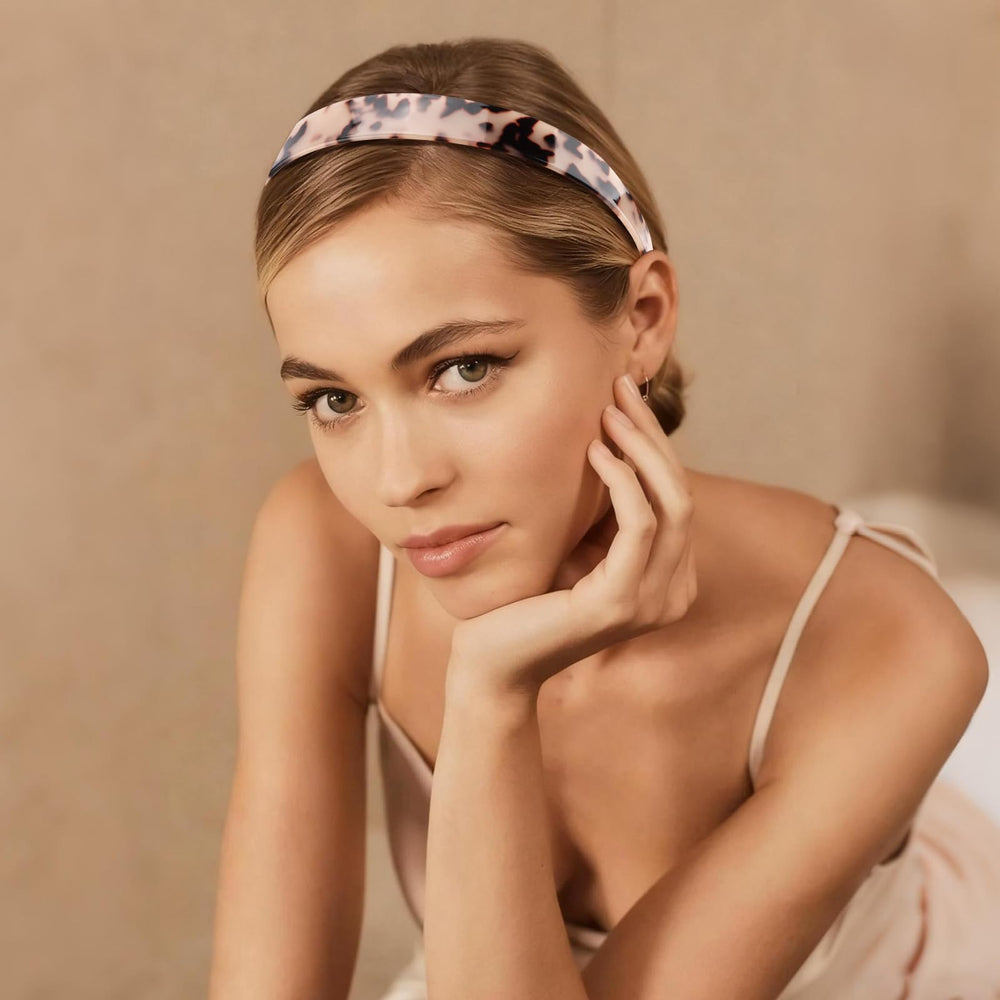 FASOTY headband next to hand showing true size and comfortable fit benefit