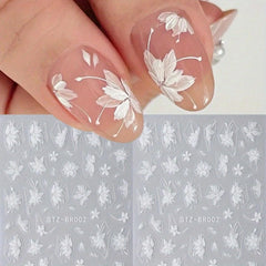 FBABFBUO front view of three decal sheets showing floral designs and colors for elegant nails