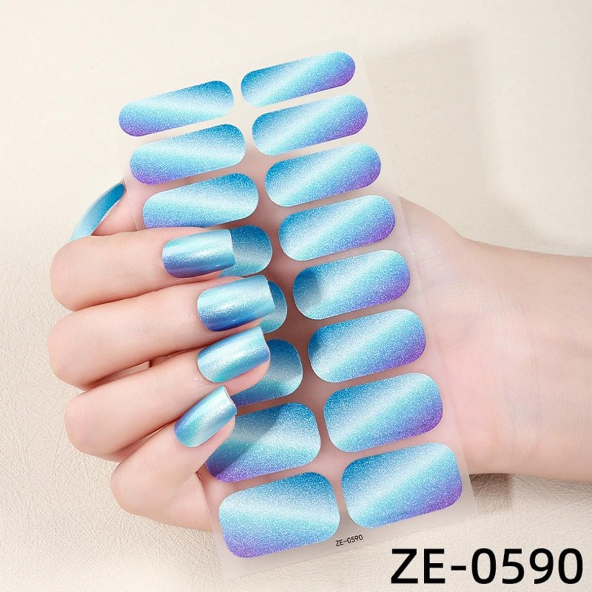 FBABFBUO lifestyle shot of finished manicure in pink purple blue gradient