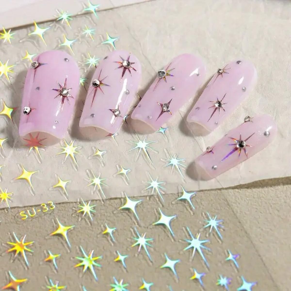 FBABFBUO decal next to a ruler, shows compact sizes for nails