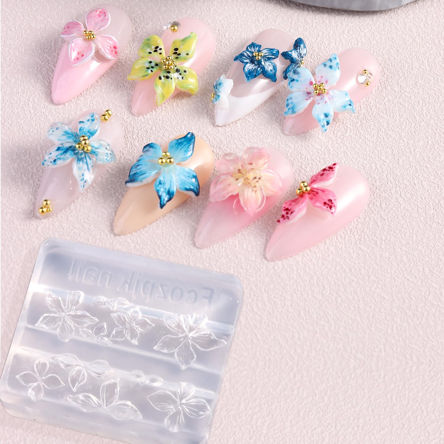 Fcozpjk 3D flower charm on nail showcasing raised design and pearly iridescent finish