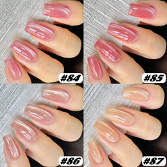 Fcozpjk finished manicure on model hand, showcases glassy cat-eye effect