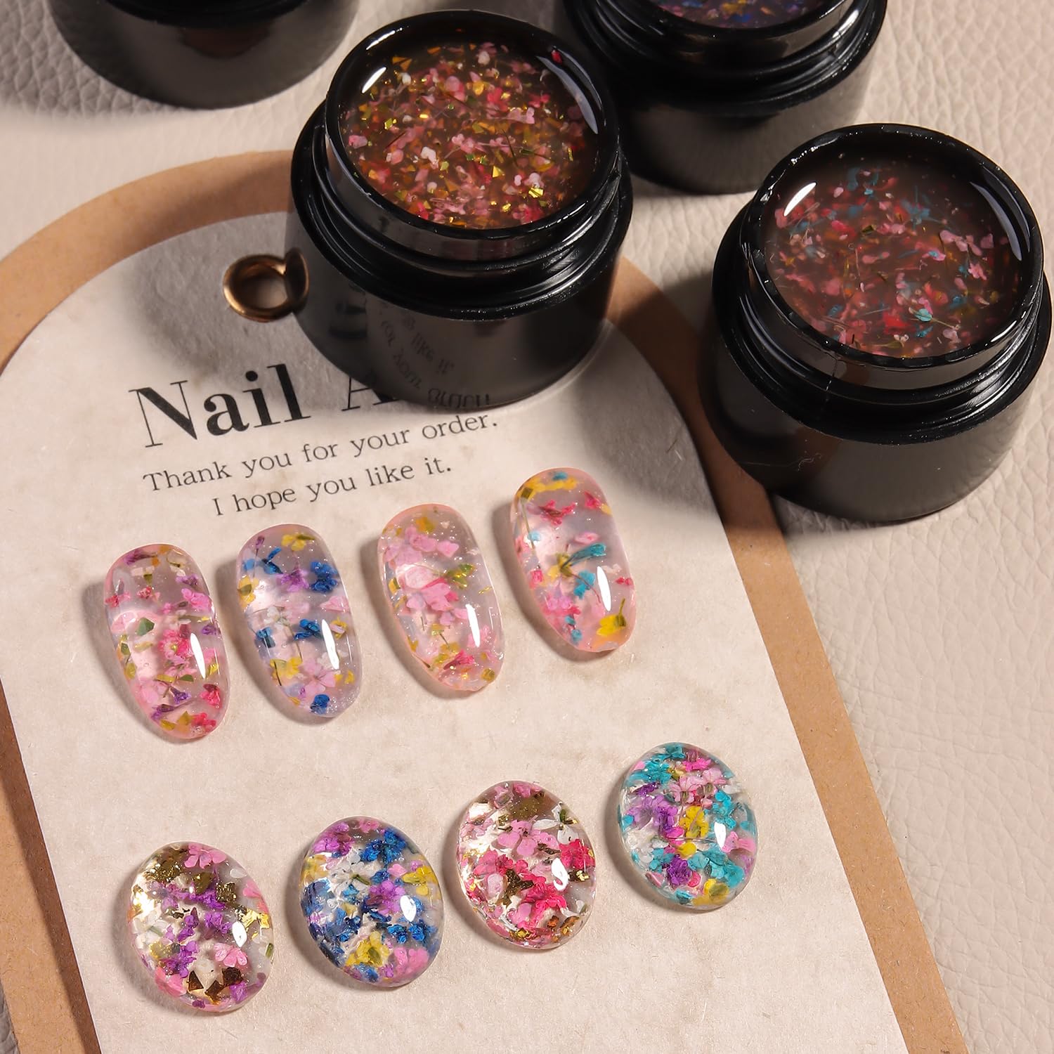 Fcozpjk swatched on nails showing floral effect and wearable polish results