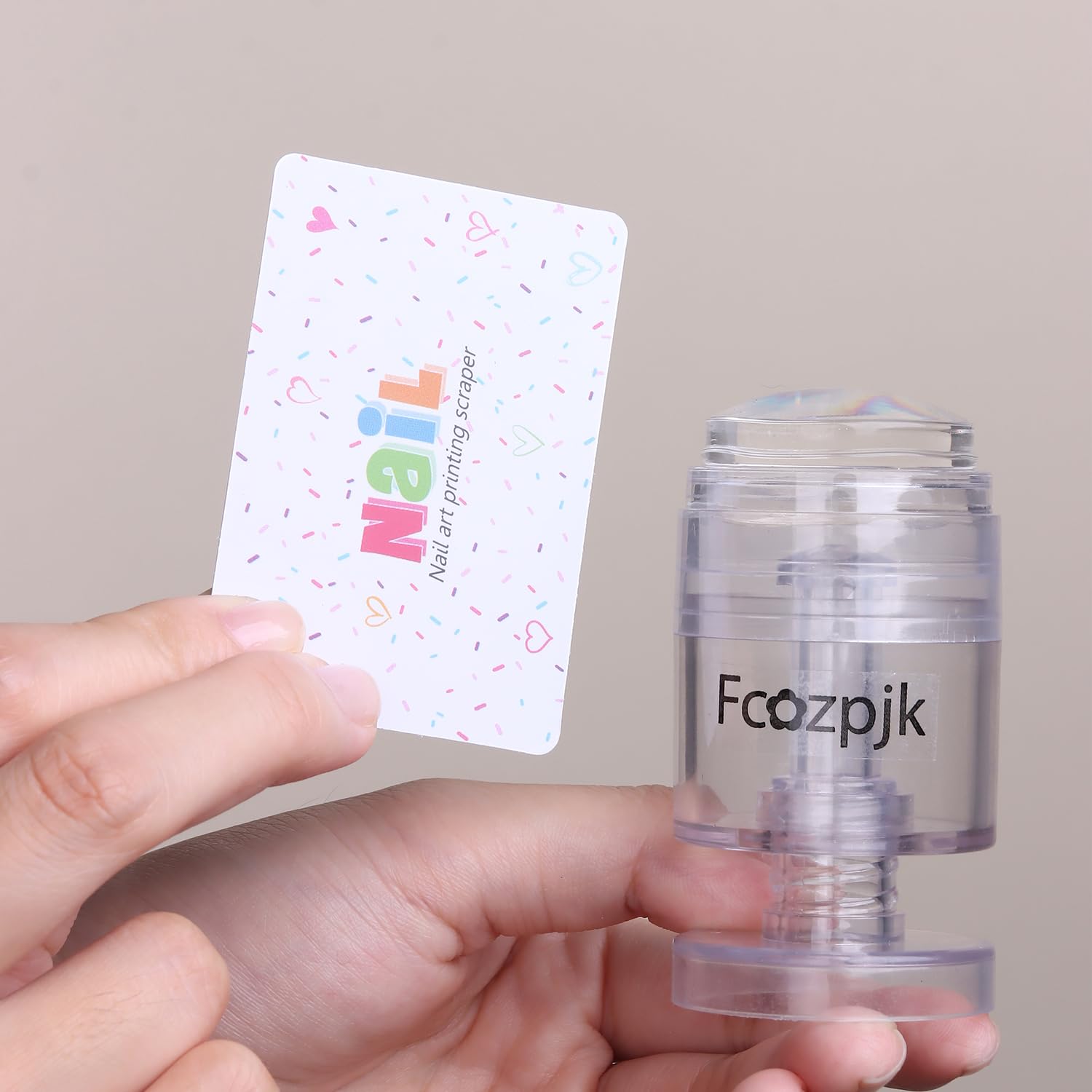 Fcozpjk stamper set on a manicure station conveying professional at-home use