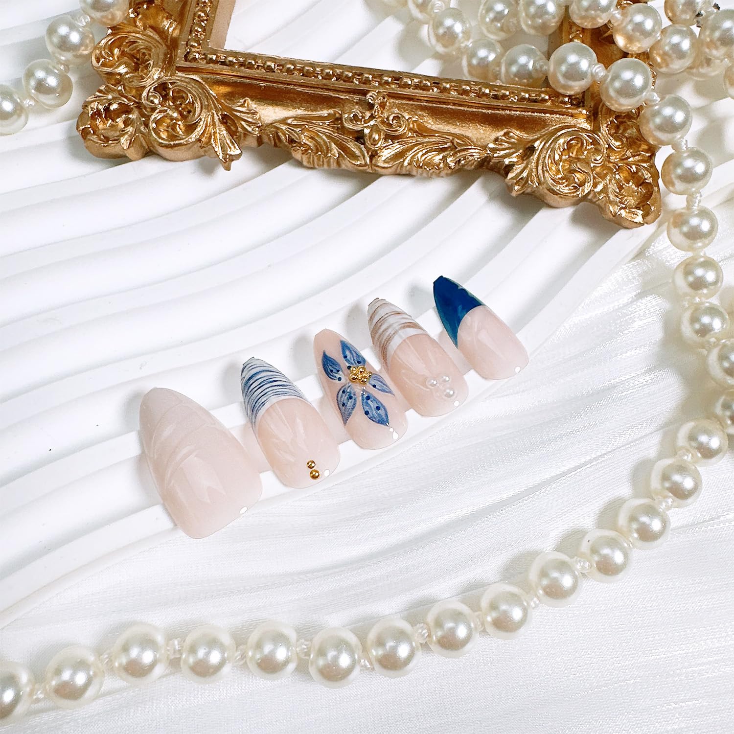 FDSQHSA adhesive tabs, nail file and wooden stick arranged to show easy at-home application