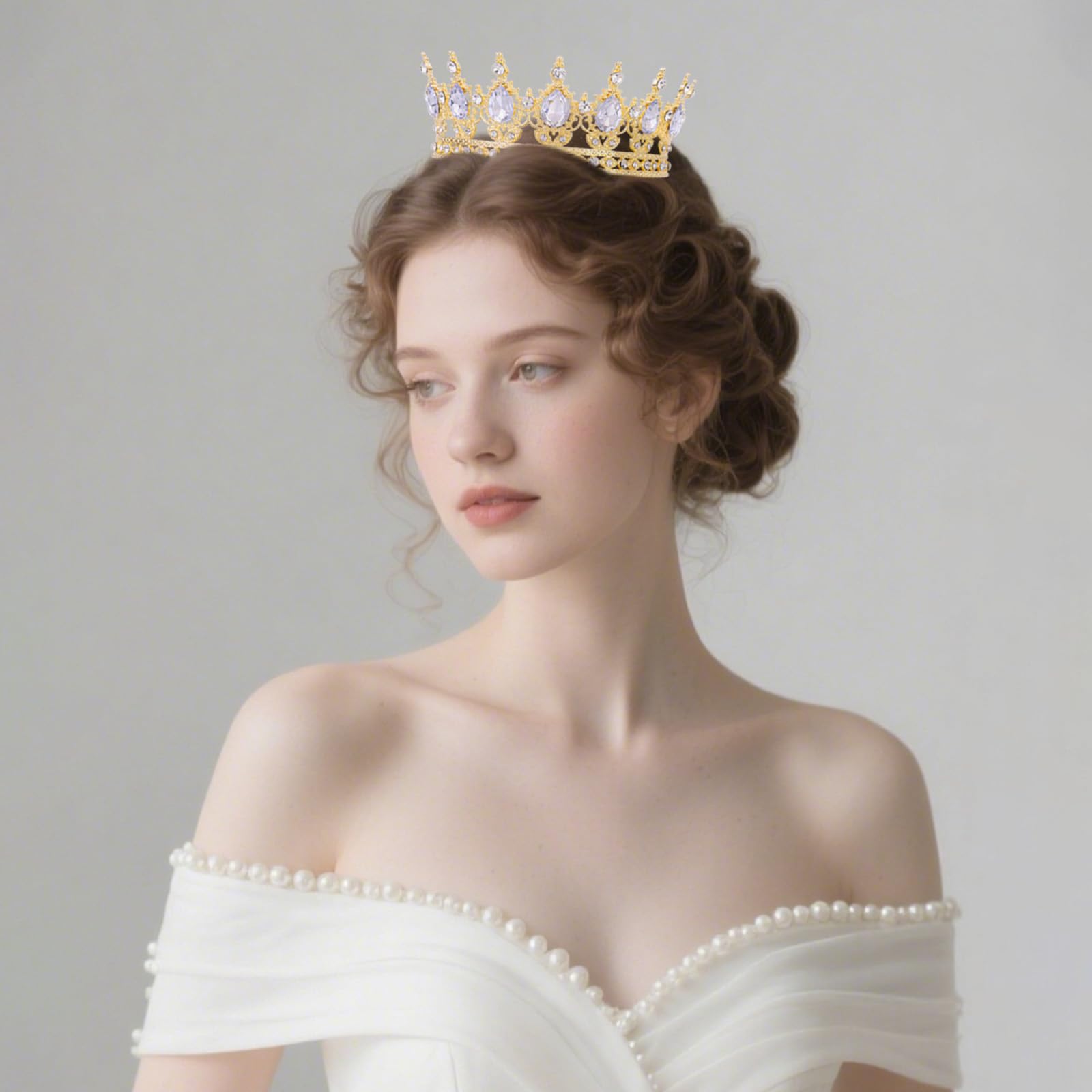 Feltent gold crown lifestyle tableau on a dressing table suggesting elegant party styling