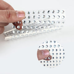 FEMBW gems decorating a photo frame for craft project inspiration