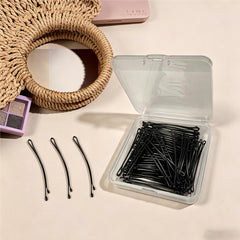 Festneno pins arranged with comb and clips in a salon kit for styling convenience