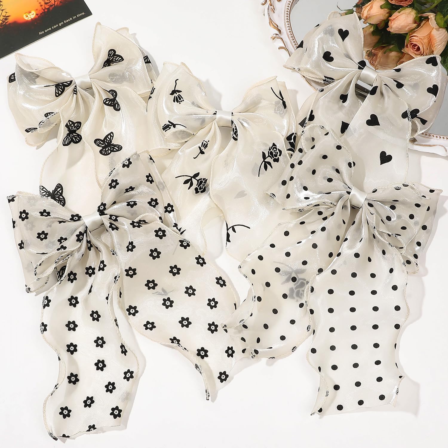 FidesAmor bow clipped in ponytail adding movement and vintage charm