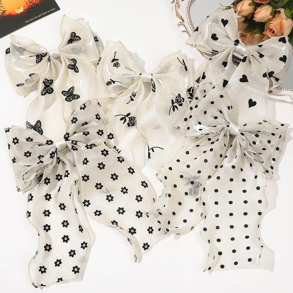 FidesAmor bow clipped in ponytail adding movement and vintage charm