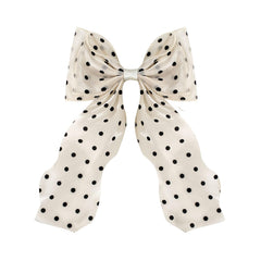 FidesAmor large polka dot bow front view showing elegant shape and bright fabric