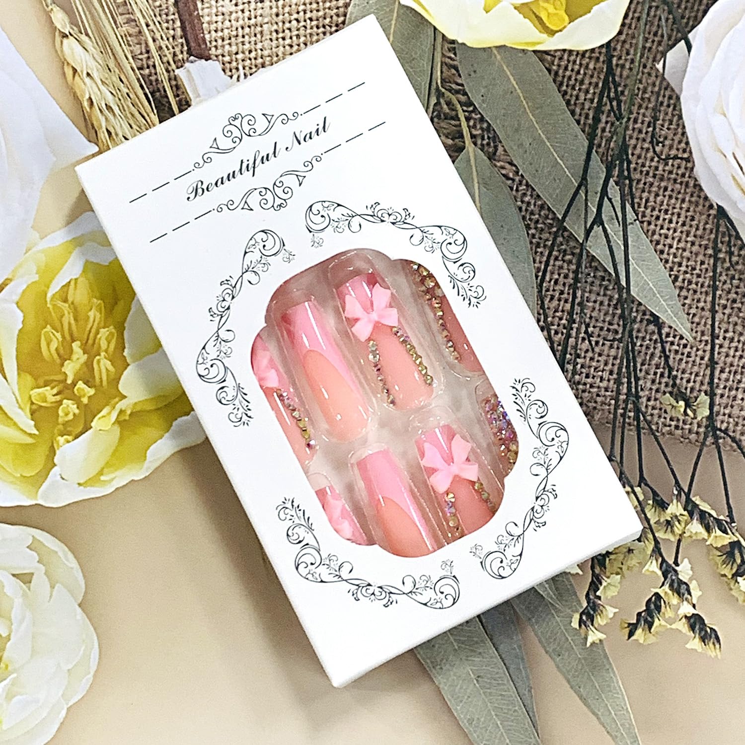 FIEONCIY lifestyle shot of nails worn at an event to convey polished, camera-ready look