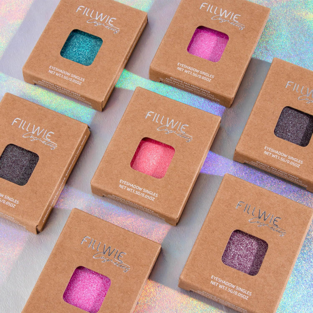 Fillwie duochrome inside makeup bag styled with brushes showing versatile on-the-go glam benefit