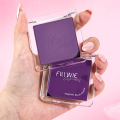 Fillwie compact beside a coin showing scale and travel-friendly size