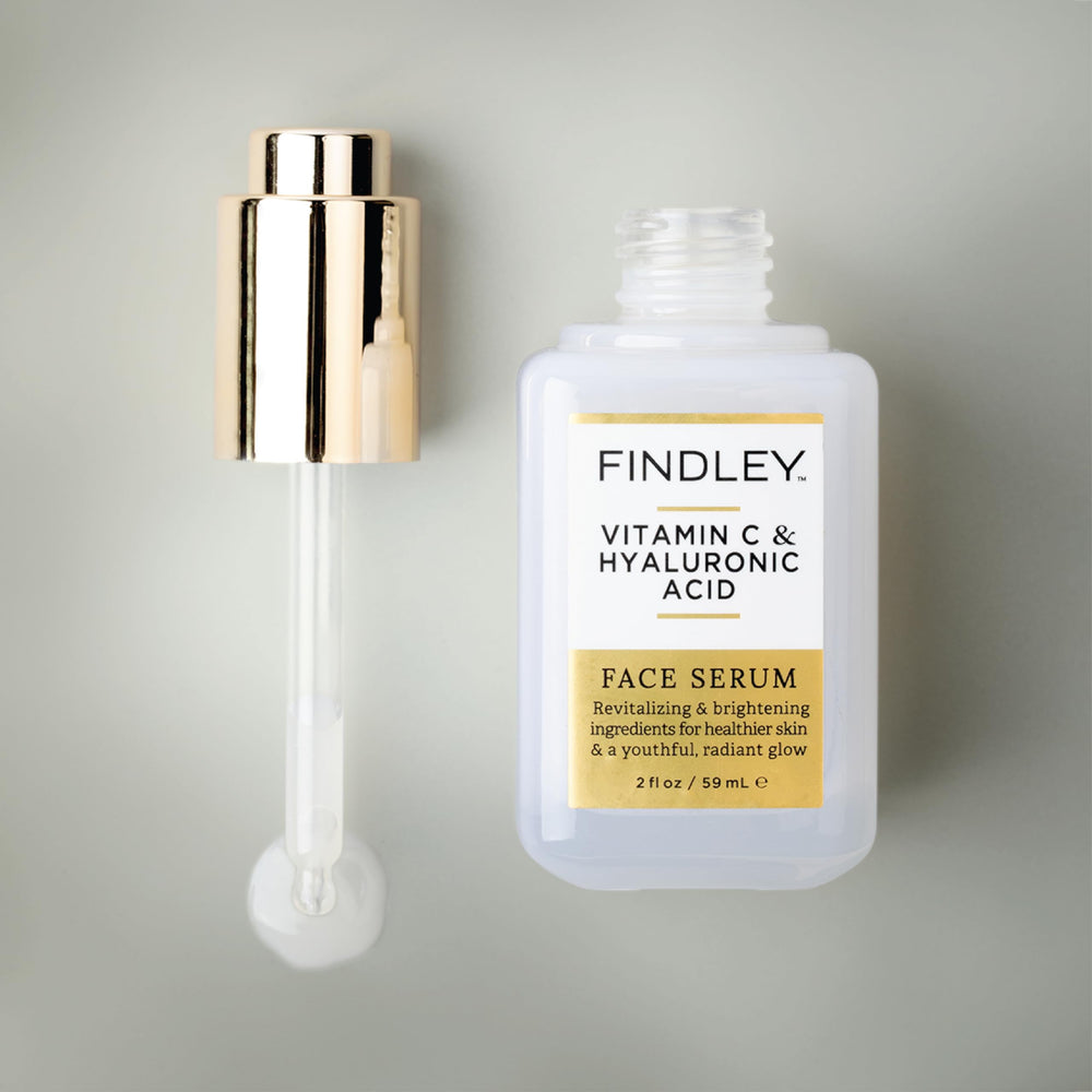 Findley bottle in hand to show 2 fl oz size and portability benefit