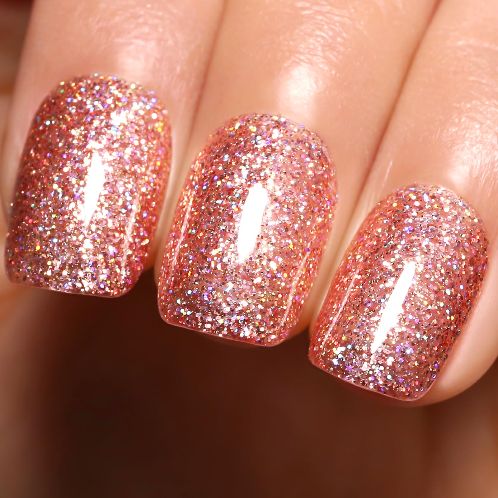 Firedeep front bottle showing rose gold glitter and glossy finish benefit