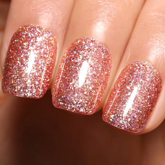 Firedeep front bottle showing rose gold glitter and glossy finish benefit