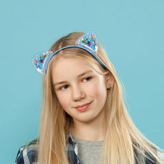 Fishdown headband next to ruler illustrating size and fit reassurance