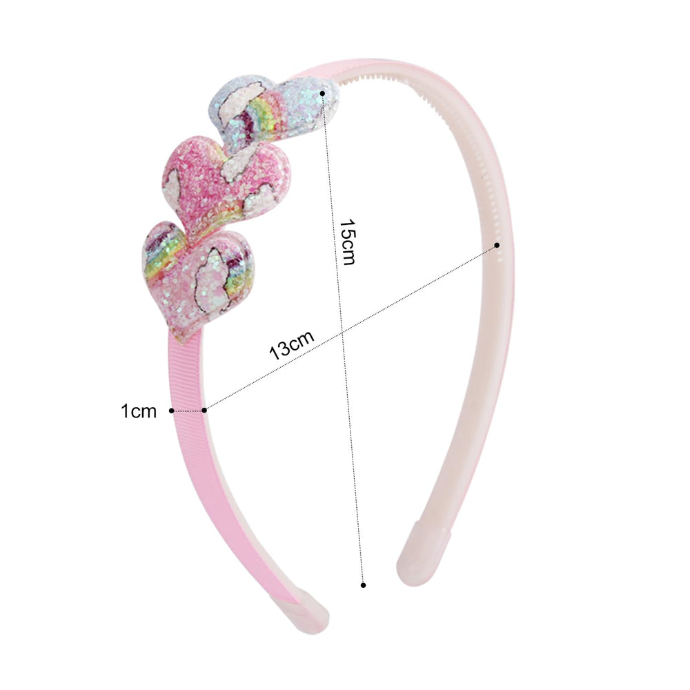 Fishdown headband beside ruler showing toddler-friendly size and fit