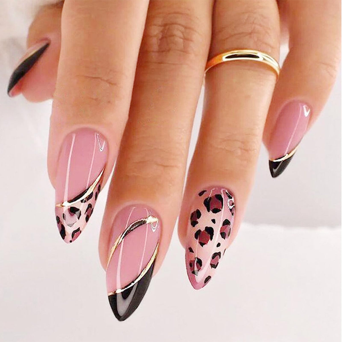 FJSMTOPl front packaging showing almond leopard nails and contents, clear quick styling benefit