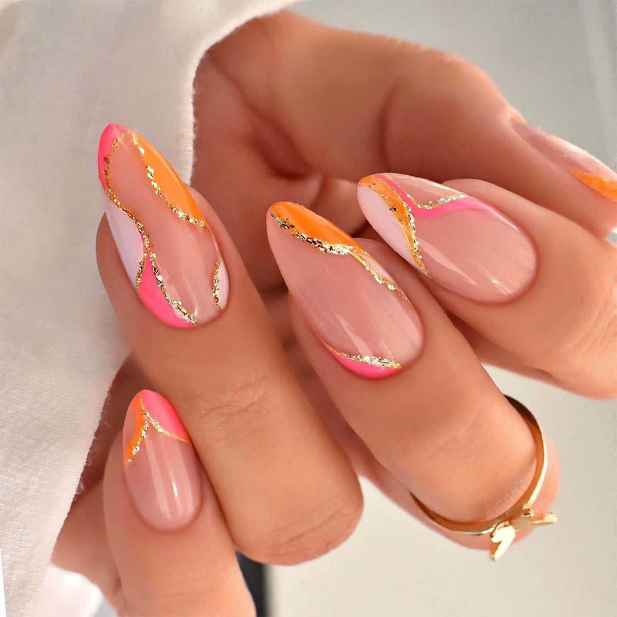 FJSMTOPl front packaging showing 24-piece orange almond press-on nails benefits effortless manicure